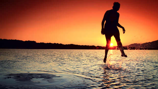 girl-skipping-water-sunset_620x350.jpg