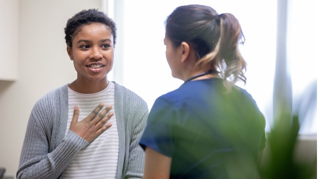 A doctor talking with a patient