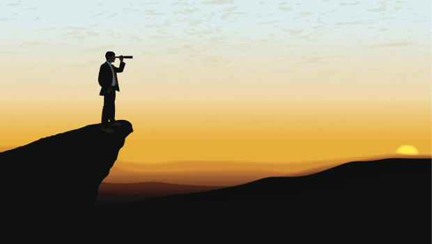 man-telescope-cliff-sunset-2col.jpg