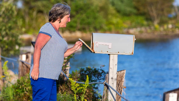 senior-woman-mailbox-lake-2col.jpg