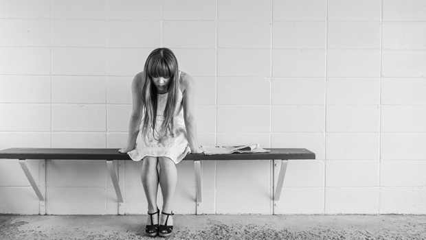 woman-bench-bw-staring-down_620x350.jpg