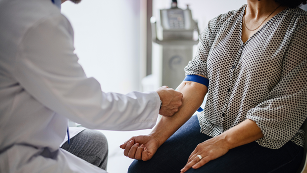 Photo of woman getting her blood drawn